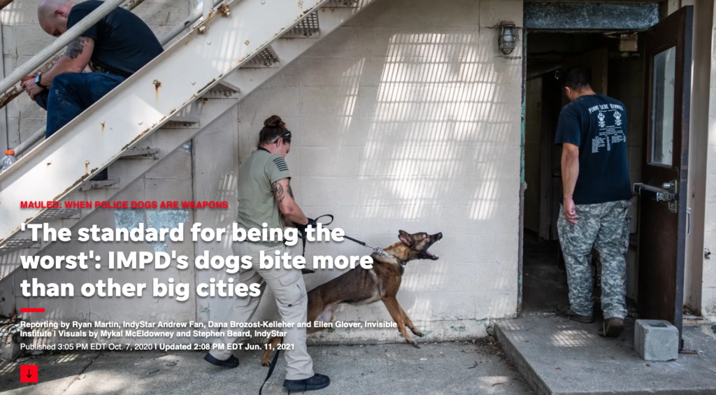 Image of a title screen for the Mauled series showing a K-9 barking at a police officer.